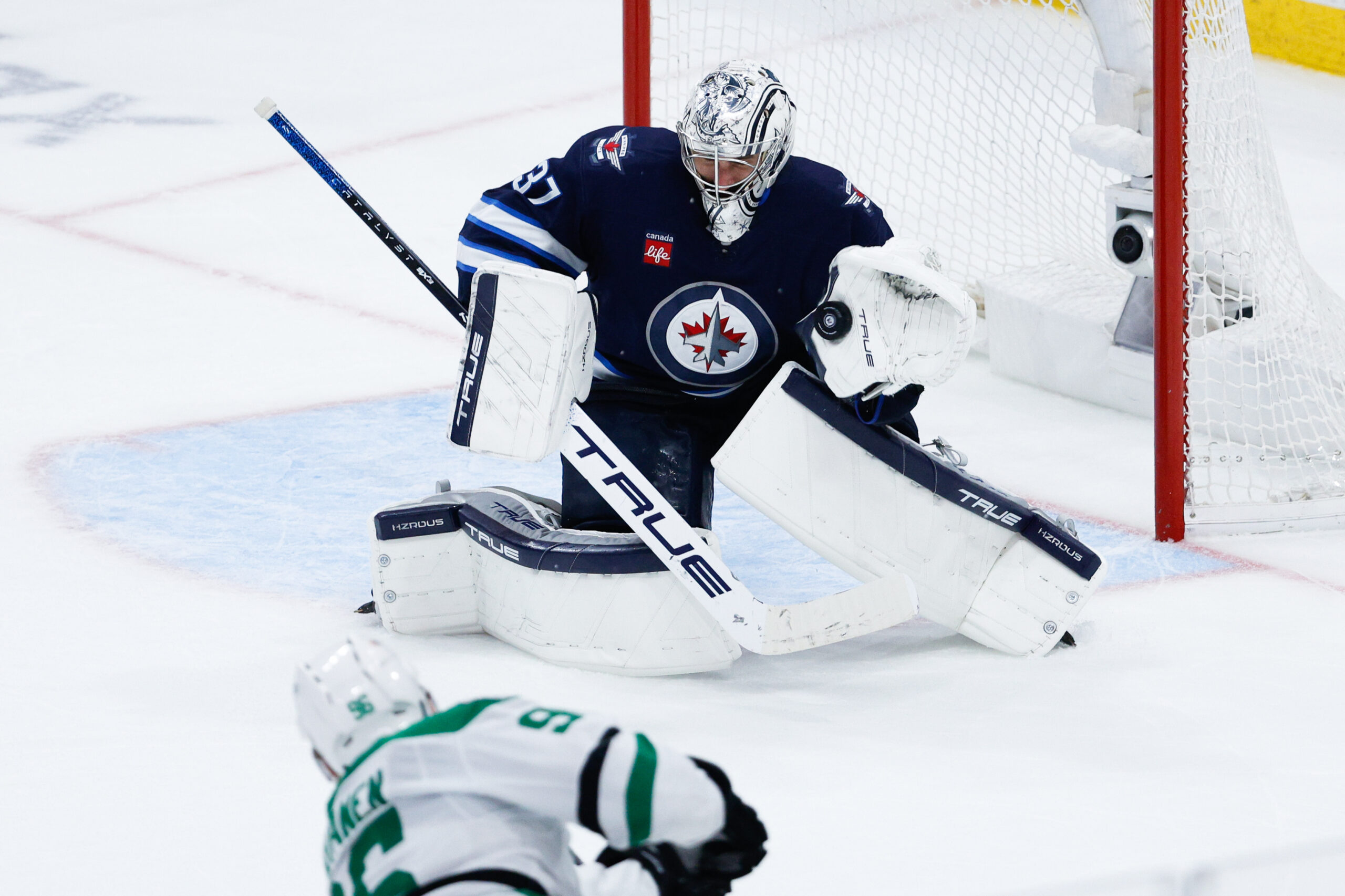 Can Connor Hellebuyck and the Jets’ Goaltending Depth Conquer the Postseason?